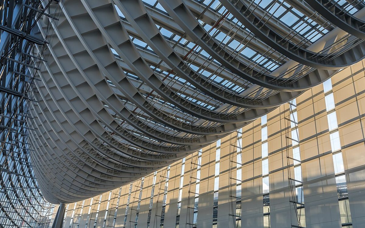 Glass roof and steel structure of a large modern atrium interior